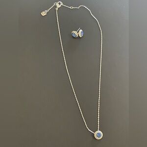 Genuine Swarovski necklace & earring set with blue centers.